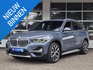 BMW X1 xDrive25e X line | 19 INCH LM VELGEN | SPORTSTOELEN | TREKHAAK | CAMERA |