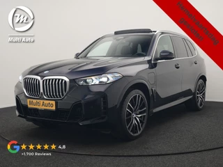 BMW X5 xDrive50e M Sport PHEV 490pk Dealer O.H. | Panodak Sky Lounge | Luchtvering | Head Up | 360 Camera | Harman / Kardon | Nappa Lederen Comfortstoelen Memory & Verwarmd | Carbon Schwarz | Apple Carplay | Keyless | Blis | 22"L.M | Plug In Hybrid |