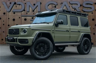 Hoofdafbeelding Mercedes-Benz G-Klasse Mercedes-Benz G-Klasse 63 AMG 4x4² | GRIJS KENTEKEN | First 40 | CARBON | AKRAPOVIC |