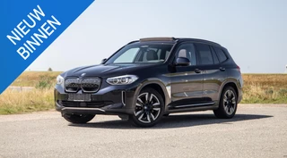 Hoofdafbeelding BMW iX3 BMW iX3 High Executive 80 kWh PANORAMADAK / CARPLAY / BRUIN LEER / NAVI