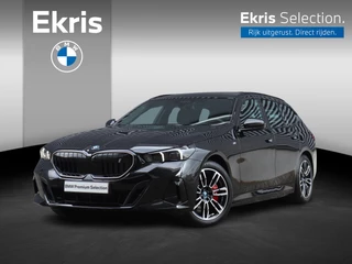 Hoofdafbeelding BMW i5 BMW i5 Touring eDrive40 | M Sportpakket Pro | Trekhaak | Driving Assistant Prof. | Adaptief M Onderstel Prof. | Harman Kardon | Head-Up | Parking Assistant Plus | Comfortstoelen | 19'' LMV | Ekris Selection