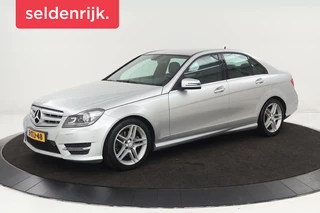 Mercedes-Benz C-klasse 180 AMG Sport | Stoelverwarming | Xenon |  Half leder | Navigatie | Climate control | Park Assist | Cruise control | Bluetooth