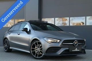 Mercedes CLA-klasse 200D AMG Shootingbrake Panodak Sfeerverlicht AdaptiveCruise Widescreen Trekhaak Mountaingrijs Uitstraling BJ2021