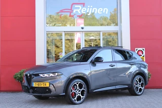 Hoofdafbeelding Alfa Romeo Tonale Alfa Romeo Tonale PHEV 280PK VELOCE | NIEUWE AUTO! | PANORAMISCH SCHUIF/KANTEL DAK | WINTERPACK: STOEL/STUUR VERWARMING | TECHNOLOGY PACK: PARKEERWAARSCHUWING VOOR EN ACHTER/360° CAMERA/AUTOMATISCH INPARKEREN/ AUTONOMOUS DRIVING LEVEL 2: ADAPTIVE CRUISE CONTROL/LANE CENTERING ASSIST/TRAFFIC JAM ASSIST DODEHOEK DETECTIE AUTOMATISCH DIMMENDE BUITENSPIEGELS | DRAADLOZE TELEFOONLADER | FULL LED MATRIX KOPLAMPEN | DUAL STAGE VALVE: ACTIEVE DEMPING | KEYLESS ENTRY/START | 19" LICHTMETALEN VELGEN | ROODGESPOTEN BREMBO REMKLAUWEN | NAVIGATIE | DRAADLOZE APPLE CARPLAY/ANDROID AUTO | ELEKTRISCH BEDIENBARE ACHTERKLEP |