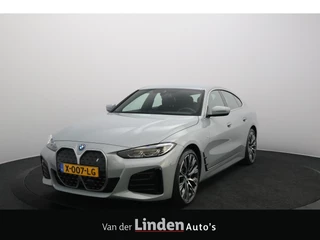 BMW i4 eDrive40 84 kWh M-Sportpakket SOH 97,4% | Brooklyn Grau | Live Cockpit Plus | Leer