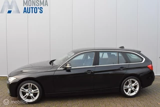 BMW 320i AUT. Touring 2014 Saphirschwarz Elek. trekhaak Xenon Clima Cruise Navi PDC