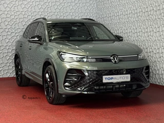 Volkswagen Tiguan 1.5 eHYBRID 272PK R-LINE PANO XL.NAVI TREKHAAK BLACK.STYLE 360.CAM ELEK.KLEP MATRIX.LED 20''LMV MASSAGE PHEV PLUG IN HYBRID Harman-Kardon "Volkswagen rijden begint bij Topautos.nl – 75 topmodellen direct op voorraad!"