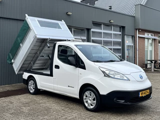 Hoofdafbeelding Nissan e-NV200 Nissan e-NV200 24KWh Marge BTW VRIJ!! Elektrische Kipper Openlaadbak met Airco Cruise controle Telefoonverbinding 2-Persoons Kieper Pick-up P-up 2x Oplaadkabels aanwezig Ex gemeente