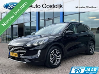 Ford Kuga 2.5 PHEV Titanium 225PK Winterpack Climate Cruise Parkeersensoren Privacy Glass Navi Carplay 18" velgen *Lage KM stand*
