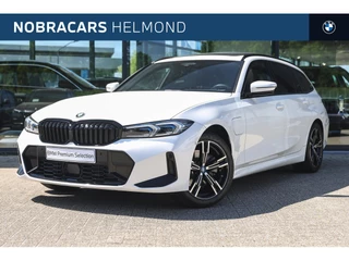Hoofdafbeelding BMW 3 Serie BMW 3 Serie Touring 330e High Executive M Sport Automaat / Panoramadak / Trekhaak / Sportstoelen / Stoelverwarming / Adaptieve LED / Driving Assistant Professional / Parking Assistant Plus