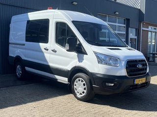 Hoofdafbeelding Ford Transit Ford Transit 350 2.0 TDCI L2H2 RWD 170pk Kastinrichting Werkplaatsinrichting Airco Cruise controle Navigatiesysteem Telefoonverbinding Parkeersensoren voor en achter 2-Persoons Bpm vrij  Sortimo Werkplaats Omvormer St