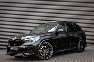 Hoofdafbeelding BMW X5 BMW X5 XDrive45e High Executive / HEAD-UP / PANO-DAK / SKY LOUNGE / LUCHTVERING / DRIVING ASSISANT / MENORY / M-SEATS / COATING