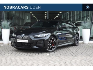 Hoofdafbeelding BMW i4 BMW i4 eDrive35 M Sport / Active Cruise Control / Parking Assistant / Comfort Access / Stoelverwarming / Widescreen Display / Live Cockpit Plus