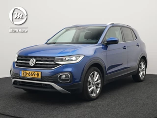 Hoofdafbeelding Volkswagen T-Cross Volkswagen T-Cross 1.0 TSI Style DSG | Trekhaak Afneembaar | Adaptive Cruise | Carplay | Camera | Sfeerverlichting | Parkassist | Dodehoek Detectie | Navi Full Map | DAB |