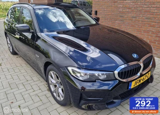 BMW 3-serie Touring 330e Sport Line Verwarmd stuur