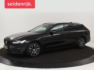 Hoofdafbeelding Volvo V90 Volvo V90 2.0 T8 Recharge AWD R-Design |  Stoel & stuurverwarming | Trekhaak | Adaptive cruise | Camera | Carplay | BLIS | Carplay | Navigatie | Keyless | Achterbankverwarming