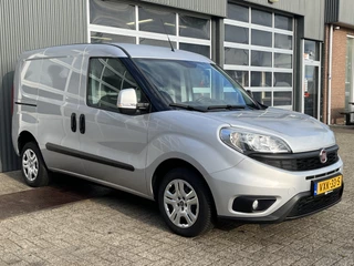 Hoofdafbeelding Fiat Doblò Fiat Doblò Cargo 1.3 MJ L1H1 SX 20x op voorraad Btw en Bpm vrij Airco Cruise controle Navigatie Tussenschot Parkeerhulp achter 1e eigenaar Ex overheid Euro 5 Marge