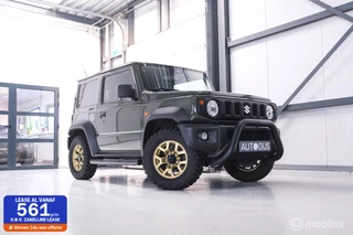 Suzuki Jimny 1.5 All Grip 4x4 | CarPlay | Camera | Stoelverwarming | BF Goodrich | Frontrunner | NL auto NAP | Groen | Lane Assist |