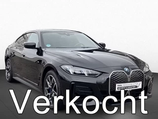 Hoofdafbeelding BMW i4 BMW i4 eDrive40 84 kWh (250kW/340pk) ** LED, LEDER, PANO, TREKH, H&K SOUND, M-REM, 18-inch LMV, ALARM ** 1e EIG - Ex BMW-AG ** ** INFORMEER OOK NAAR ONZE AANTREKKELIJKE FINANCIAL-LEASE TARIEVEN **