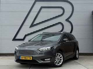 Ford Focus Wagon 1.0 Titanium 1e Eigenaar|Navi|Clima|Cruise|Carplay|Stoel+Stuur verw|PDC V+A|APK tot 12-2026