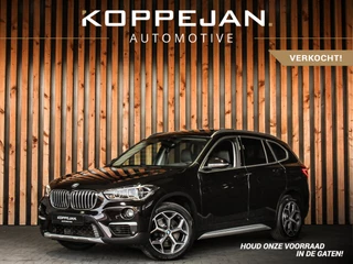 BMW X1 sDrive20i Orange Edition III | HEAD-UP | PANORAMADAK | STOELVERWARMING | NAVI |