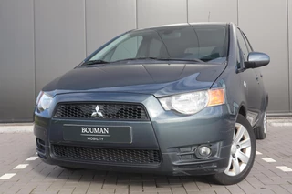 Hoofdafbeelding Mitsubishi Colt Mitsubishi Colt 1.3 35 JAHRE, CRUISE, AIRCO, PDC, 5DEURS