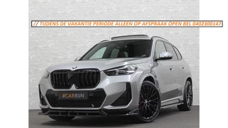 BMW X1 18i M-Sport Performance-Pack | Panorama | Sportstoelen | Carbon | Keyless-Entry | Sfeerverlichting | Achteruitrij-Camera | 5x op voorraad | Carplay | Full-LED | Black-Optic | Getint Glas | Stoelverwarming | Draadloos Laden |