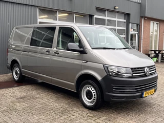 Volkswagen Transporter 2.0 TDI L2H1 DC Airco Cruise controle Telefoonverbinding Trekhaak 2200kg trekgewicht Apple carplay Navigatiesysteem schuifdeur Euro 6 Dealer onderhouden 1e Eigenaar