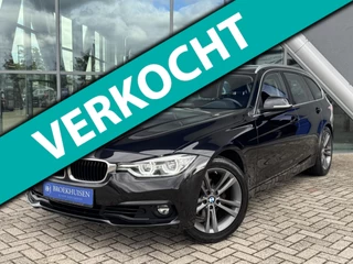 Hoofdafbeelding BMW 3 Serie BMW 3-serie Touring 320i High Executive 184pk Automaat / Trekhaak / Stoelverwarming