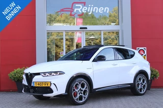 Alfa Romeo Tonale PHEV 280PK VELOCE | PANORAMISCH SCHUIF/KANTEL DAK | PREMIUM PACK: LEDEREN BEKLEDING/GEVENTILEERDE VOORSTOELEN/4-VOUDIG ELEKTRISCH VERSTELBARE LENDESTEUN VOORSTOELEN/HOOGGLANS ZWARTE RAAMOMLIJSTING/AMBIENT LIGHTING | TECHNOLOGY PACK: PARKEERWAARSCHUWING VOOR EN ACHTER/360° CAMERA/AUTOMATISCH INPARKEREN/ AUTONOMOUS DRIVING LEVEL 2: ADAPTIVE CRUISE CONTROL/LANE CENTERING ASSIST/TRAFFIC JAM ASSIST DODEHOEK DETECTIE AUTOMATISCH DIMMENDE BUITENSPIEGELS ELEKTRISCH BEDIENBARE ACHTERKLEP | WINTERPACK: STOELVERWARMING VOOR/STUURVERWARMING/VERWARMBARE RUITENSPROEIERS | HARMAN KARDON SOUND SYSTEM | 20" LICHTMETALEN VELGEN "GRAPHITE GREY" | DRAADLOZE TELEFOONLADER | NAVIGATIE | DRAADLOZE APPLE CARPLAY/ANDROID AUTO | FULL LED MATRIX KOPLAMPEN |