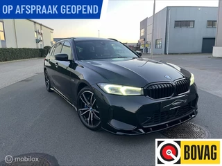 BMW 3-serie Touring 330e xDrive M Sport | H/K | Panodak | Leder | HUD