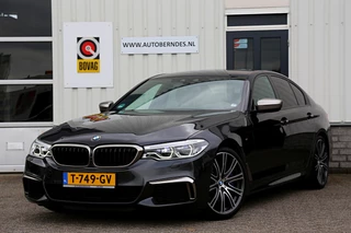 Hoofdafbeelding BMW 5 Serie BMW 5 Serie M550i V8 462PK xDrive High Executive*Perfect BMW Onderh.*Bowers&Wilkins Diamond/Co-Pilot Pack/Softclose/Nachtzicht/Head-Up/Apple Carplay-Android/M-Stof/Stoelverw./Stuurwielverw./360/Adapt. Koplampen/Elek. Achterklep/Standkachel/VOL*