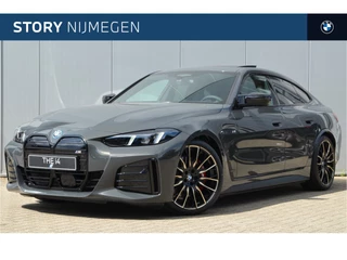 Hoofdafbeelding BMW i4 BMW i4 eDrive40 eDrive40 Gran Coupé High Executive M Sport / Schuif-kanteldak / M Sportstoelen / Adaptieve LED / Parking Assistant Plus / Comfort Access / Stuurverwarming