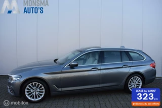 Hoofdafbeelding BMW 5 Serie BMW 520d Touring Luxury Bluestonemet. Pano Comfortstoel DAB HiFi Trekhaak