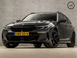 BMW 3 Serie Touring 330e M-Sport 293Pk Automaat (DRAVITGRAU, FACELIFT, LASER KOPLAMPEN, HEAD-UP DISPLAY, CAMERA, M PAKKET, KEYLESS, MEMORY SEATS, ADAPTIVE CRUISE, SFEERVERLICHTING, APPLE CARPLAY, DAB+, NIEUWSTAAT)