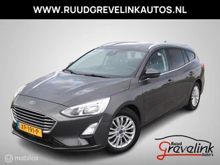 Hoofdafbeelding Ford Focus Ford Focus Wagon 1.5 EcoB 150 PK H6 Titanium Navigatie Stoel+Stuurverw Clima Pdc V+A