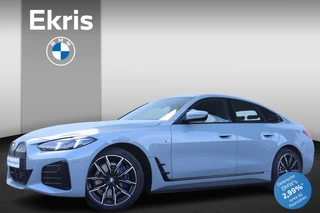 Hoofdafbeelding BMW i4 BMW i4 eDrive40 84 kWh M Sportpakket/ Comfort Access/ Achteruitrijcamera/ Elektrische Stoelen/ Stoelverwarming/ Harman-Kardon/ Active Cruise Control