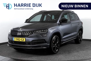 Hoofdafbeelding Škoda Karoq Škoda Karoq 1.5 TSI ACT Sportline Business 150 PK - Automaat | Trekhaak | Dig.Cockpit | Adapt.Cruise | Stoel-+Stuurverw. | Camera+PDC | NAV+App | LM 18'' |