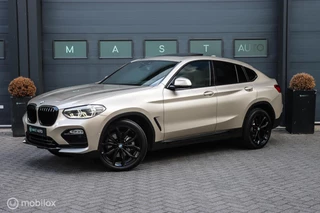 Hoofdafbeelding BMW X4 BMW X4 xDrive20i High Executive | HUD | Pano | Individual | Dealer