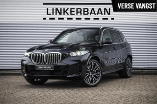 BMW X5 xDrive50e Hybride | Uniek | M Sport | Individual | B&W | Panodak | 4WS | Trekhaak | 22 inch | NL auto |