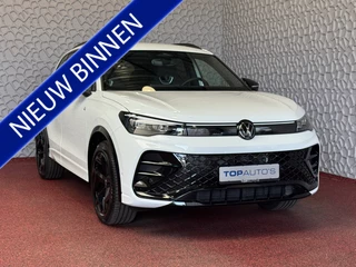 Volkswagen Tiguan 1.5 eTSI R-LINE 3D LED GRILL 19''LMV ERGO.STOEL MASSAGE ELEK.KLEP DESIGN PACK STOEL/STUUR VERW TREKHAAK NIEUWE AUTO! 09/2024 70 BIJNA NIEUWE VOLKSWAGEN'S UIT VOORRAAD LEVERBAAR