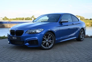 Hoofdafbeelding BMW 2 Serie BMW 2-serie Coupé M235i | H&K | Keyless | PANO | Memory |