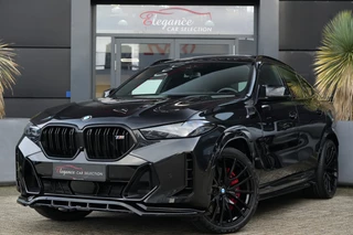 Hoofdafbeelding BMW X6 BMW X6 M60i xDrive High Executive 531pk Panoramadak/Maxton/360Camera