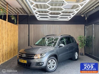 Volkswagen Tiguan 1.4 TSI Sport&Style | PDC | Camera | Navi