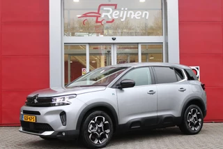Hoofdafbeelding Citroën C5 Aircross Citroen C5 Aircross 1.6 225PK Plug-in Hybrid FEEL | NAVIGATIE | ACHTERUITRIJ CAMERA | DODEHOEKDETECTIE | APPLE CARPLAY/ANDROID AUTO |  CLIMATE CONTROL | DAB RADIO | ADAPTIVE CRUISE CONTROL | VERSTELBARE ACHTERSTOELEN | LANE-ASSIST |