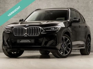 Hoofdafbeelding BMW X3 BMW X3 xDrive30e High Executive 293Pk Automaat (PANORAMADAK, M PAKKET, APPLE CARPLAY, GROOT NAVI, CAMERA, LEDEREN SPORTSTOELEN, GETINT GLAS, SFEERVERLICHTING, DAB+, NIEUWSTAAT)