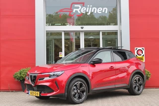 Alfa Romeo Junior 1.2 Turbo 136PK IBRIDA SPECIALE | NIEUWE AUTO! | PANORAMISCH SCHUIF/KANTEL DAK | SPORT PACK: SABELT SPORT STOELEN/ALCANTARA STUURWIEL | TECHNO PACK: LED MATRIX KOPLAMPEN/DRAADLOZE TELEFOONLADER/ACHTERUITRIJ CAMERA | VERWARMBARE VOORRUIT | 18" LICHTMETALEN VELGEN "PETALI" | DRAADLOZE APPLE CARPLAY/ANDROID AUTO | BRERA RED MET ZWART DAK | NAVIGATIE | STOEL VERWARMING | DODEHOEK DETECTIE | ELEKTRISCH BEDIENBARE ACHTERKLEP | KEYLESS ENTRY/START | ADAPTIVE CRUISE CONTROL |
