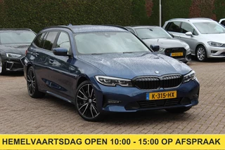 BMW 3 Serie Touring 330e eDrive Edition / Leder / Ambiance / CarPlay / Parkeerhulp V+A / 19'' / Harman Kardon Getint glas / Virtual Cockpit / Stoelverwarming 4x / DAB / Cruise Control