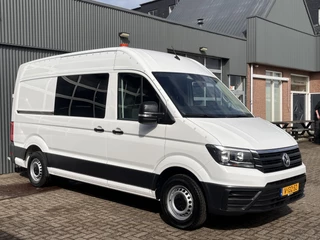 Volkswagen Crafter 35 2.0 TDI L3H3 oud L2H2 Airco Cruise control Trekhaak 3000kg Kastinrichting Omvormer Standkachel werkplaats Navigatiesysteem Telefoonverbinding 2-Persoons Camera