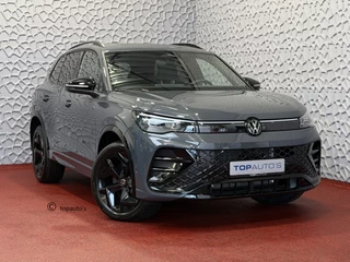 Volkswagen Tiguan 1.5 eHYBRID 272PK NW AUTO R-LINE BLACK PANO XL.NAVI BLACK.STYLE 360.CAM ELEK.KLEP MATRIX.LED 20''LMV MASSAGE SCHUIFDAK PHEV PLUG IN HYBRID "Volkswagen rijden begint bij Topautos.nl – 75 topmodellen direct op voorraad!"